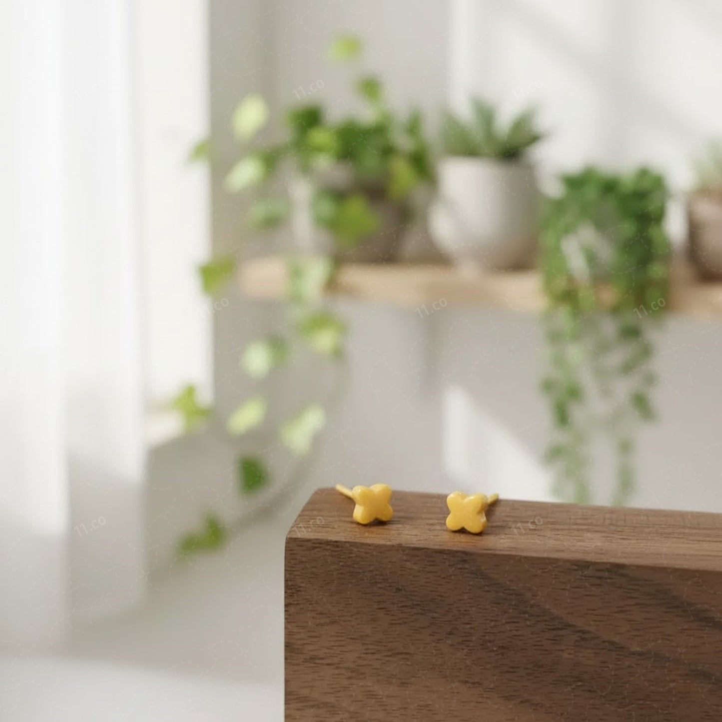 Four-leaf clover stud earrings